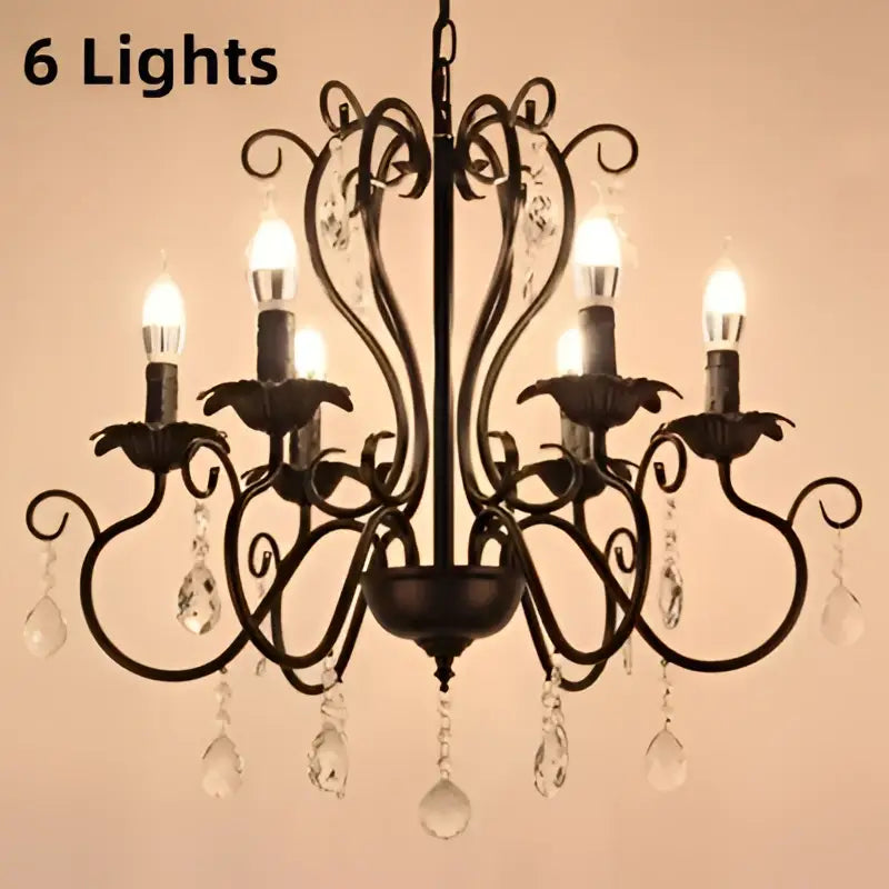 Black white metal chandelier with six lit bulbs and crystal pendants for dining room decorbites black white style