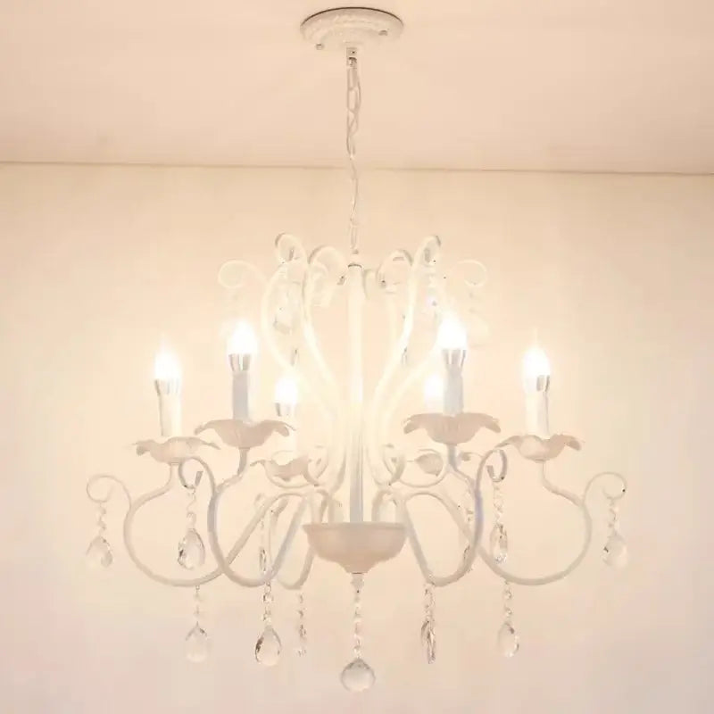 White wrought iron chandelier with crystal pendants and candle-style bulbs for dining room decorbites black white metal design
