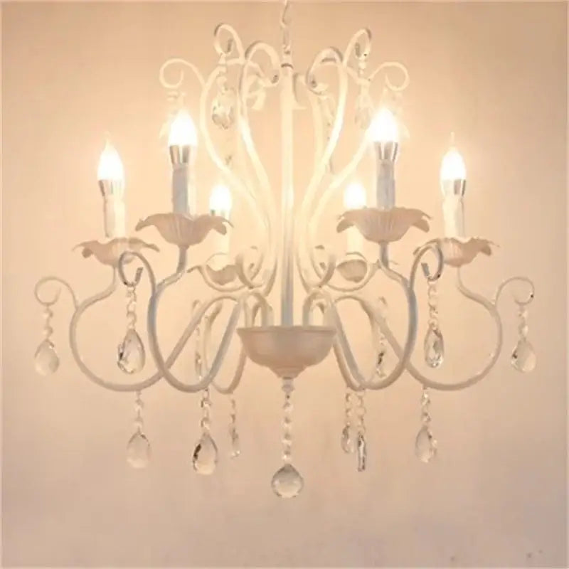 White wrought iron chandelier with crystal pendants and candle-style bulbs for decorbites black white metal decor