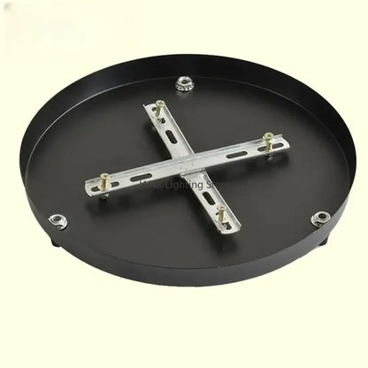 Black circular pendant light with silver metal decorbites ceiling mount canopy and screws for dining room use