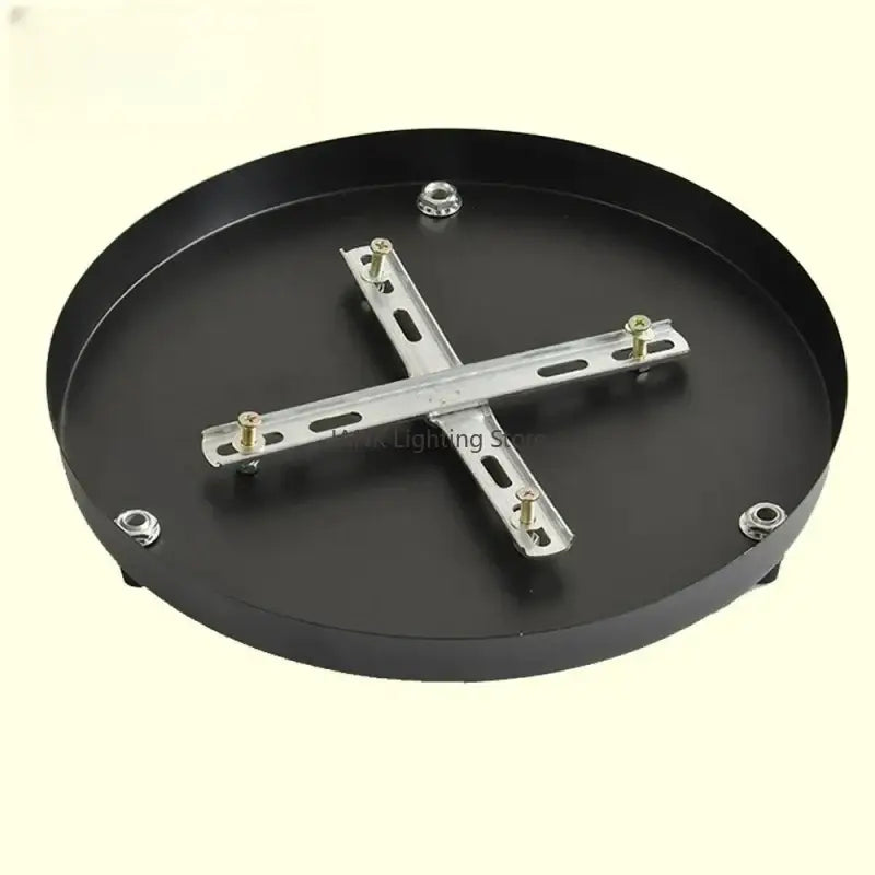 Black circular pendant light with silver metal decorbites ceiling mount canopy and screws for dining room use