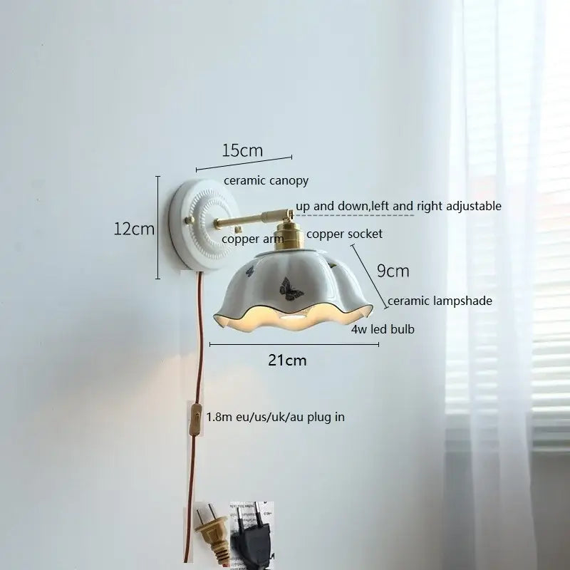 White butterfly ceramic led wall lamp with delicate fluted scalloped shade and brass-finished copper arm for bedroom