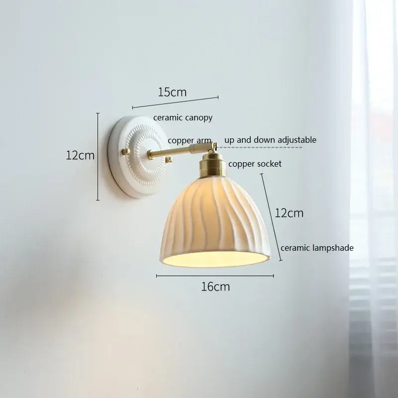 Cream-colored butterfly ceramic led wall lamp with ribbed scalloped ceramic led wall sconce and copper accents