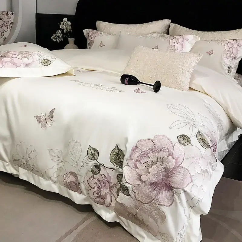 Cream-colored satin duvet cover with delicate pink and gray butterfly flowers embroidery made of Egyptian cotton