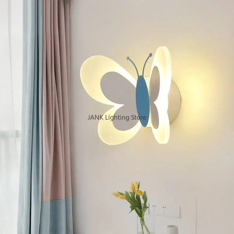 White butterfly led wall lamp with soft glowing translucent wings and solid blue body for bedroom decorbites butterfly led light
