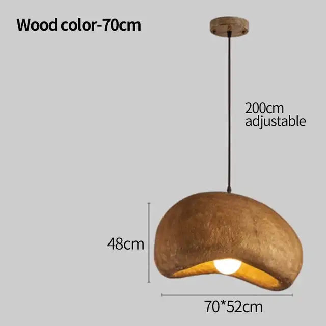 A rustic wood-toned decorbites cement wind cloud pendant light with warm glow for living room trio decor