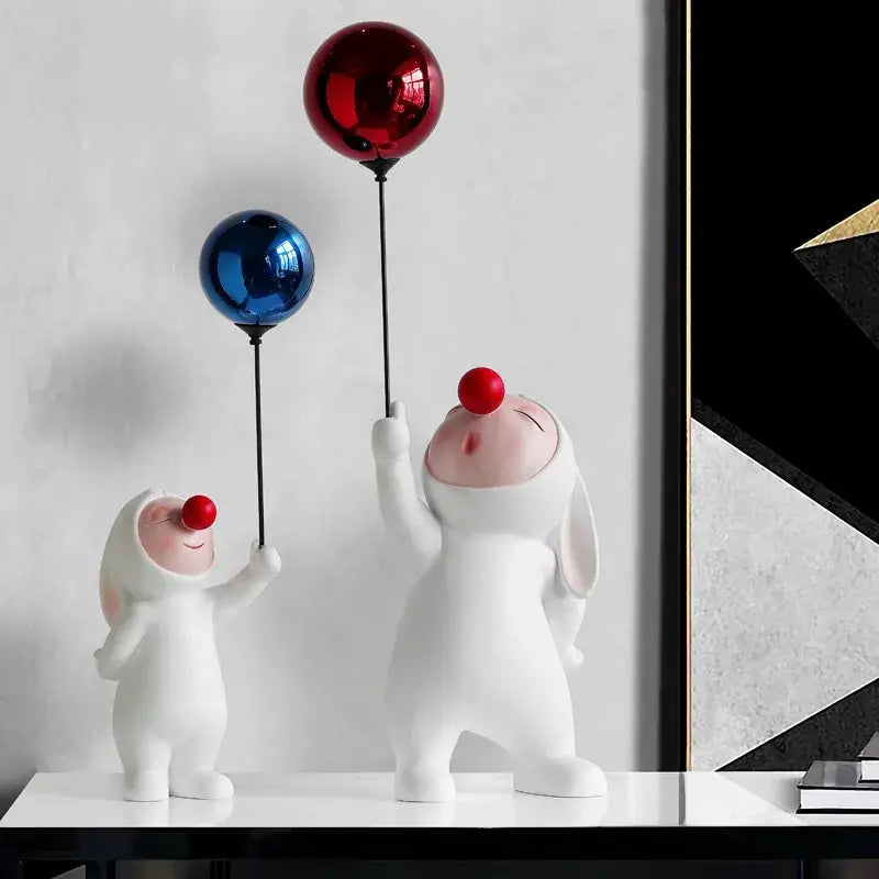 White ceramic balloon rabbit resin ornaments featuring clown figurines holding shiny red and blue balloons for desk decor