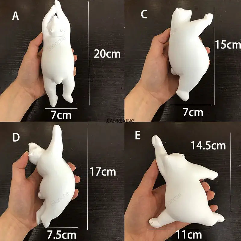 White ceramic polar bear figurines with rounded belly and stretched limbs in playful poses on a bear led ceiling chandelier