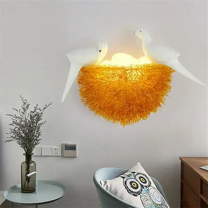 White ceramic bird nest led wall lamp with a glowing orange textured base for bedroom decorbites bird nest decorbites bird nest wall lamp