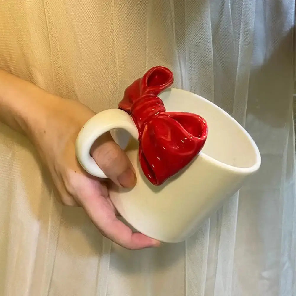 White ceramic bow knot mug featuring a glossy red bow knot ceramic design for dining room decorbites style porcelain cup