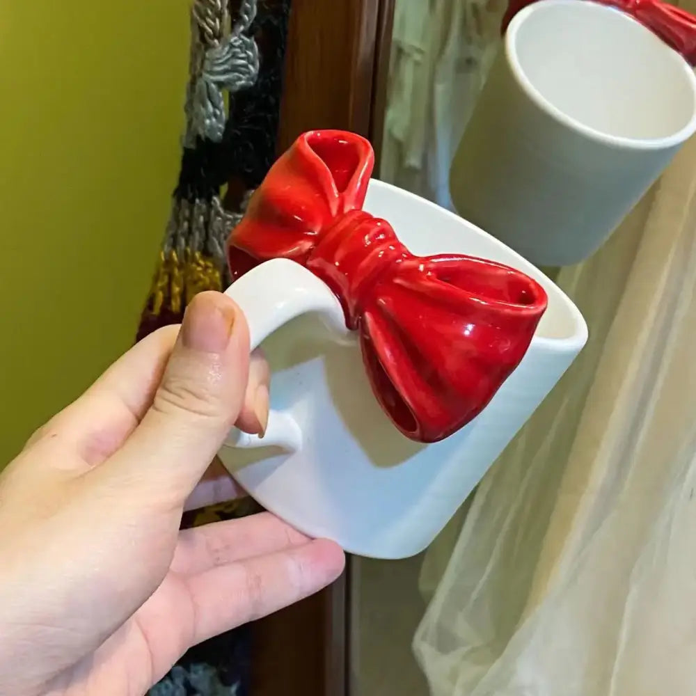 White ceramic bow knot mug with a glossy red bow knot ceramic handle for dining room decorbites bow knot porcelain cup