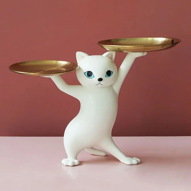 White ceramic cat tray sculpture with blue eyes balancing two gold plates for office desk storage accessory