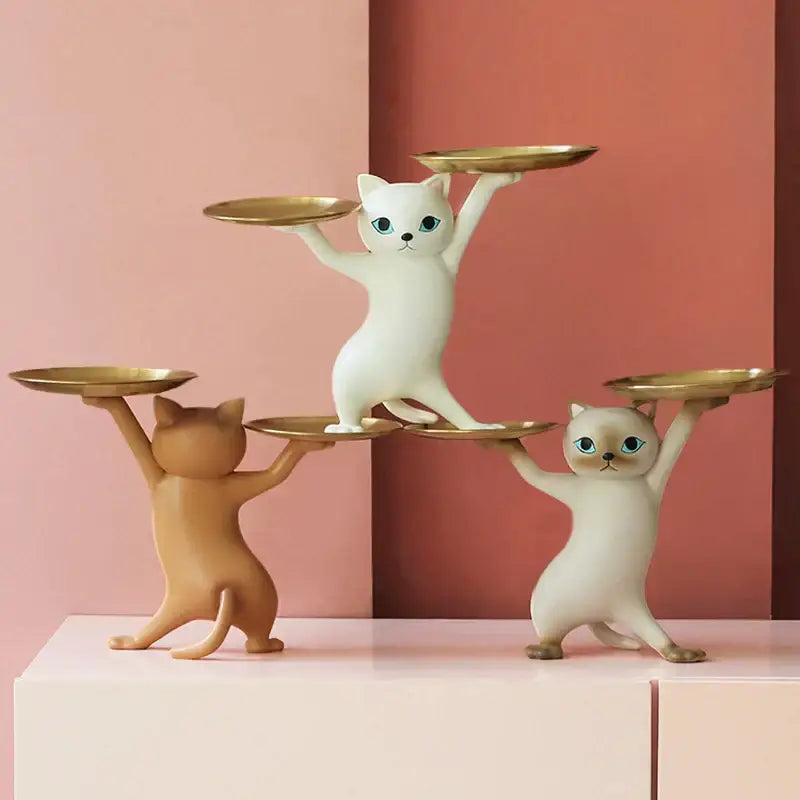 White ceramic cat tray sculpture with three whimsical resin cat figurines holding golden trays for desk storage accessory