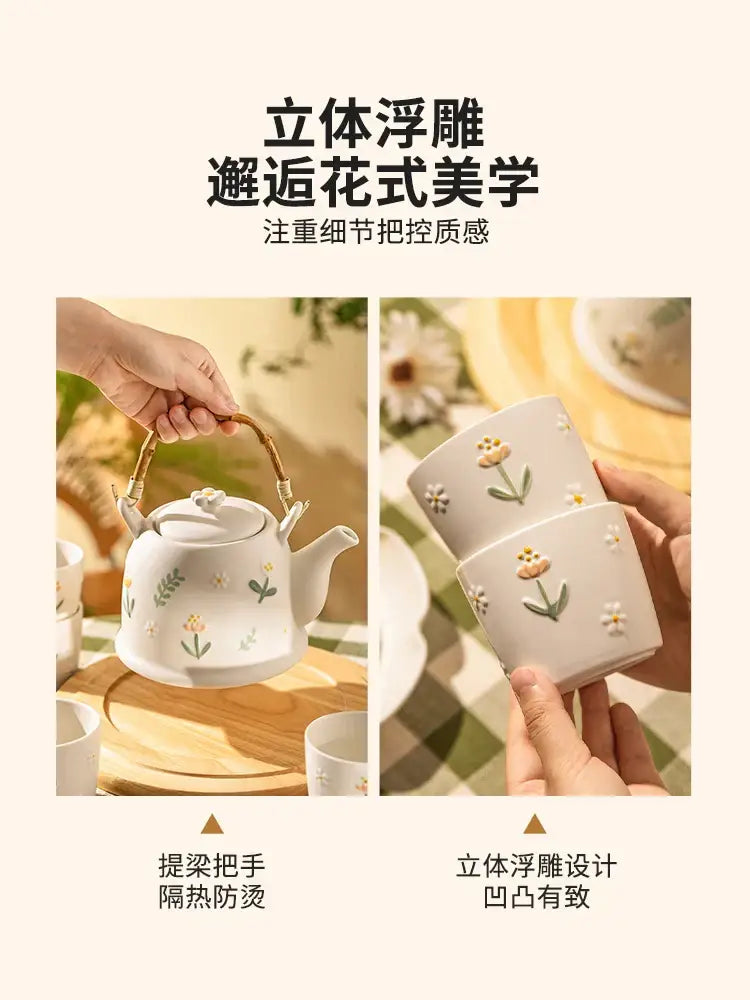 White ceramic daisy teapot set with floral relief designs and bamboo handles for a rustic kitchen tea set