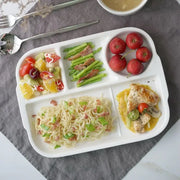 White ceramic divided plate featuring multiple compartments ideal for dining by decorbites ceramic divided tray
