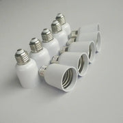 White ceramic e27 to e40 light bulb adapter socket set with metallic screw bases for garage and utility use