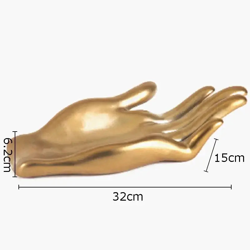 Golden glossy hand-shaped fruit plate tray with smooth sculpted contours and reflective metallic finish for living room decor