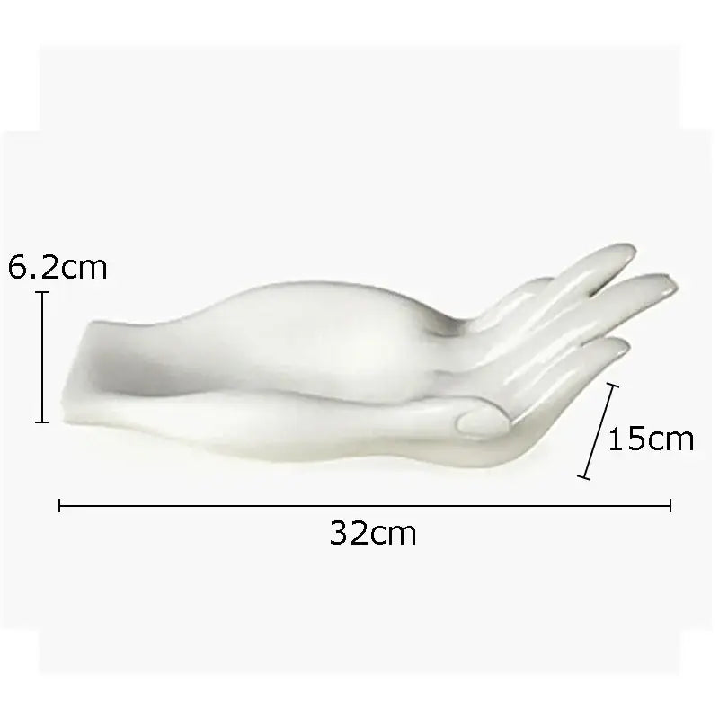 White ceramic hand fruit plate tray featuring a smooth glossy finish and sculpted palm and fingers for living room decor
