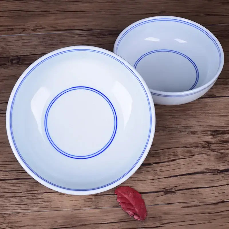 White ceramic noodle bowl with delicate blue concentric circles on rim and interior by decorbites blue for dining room use