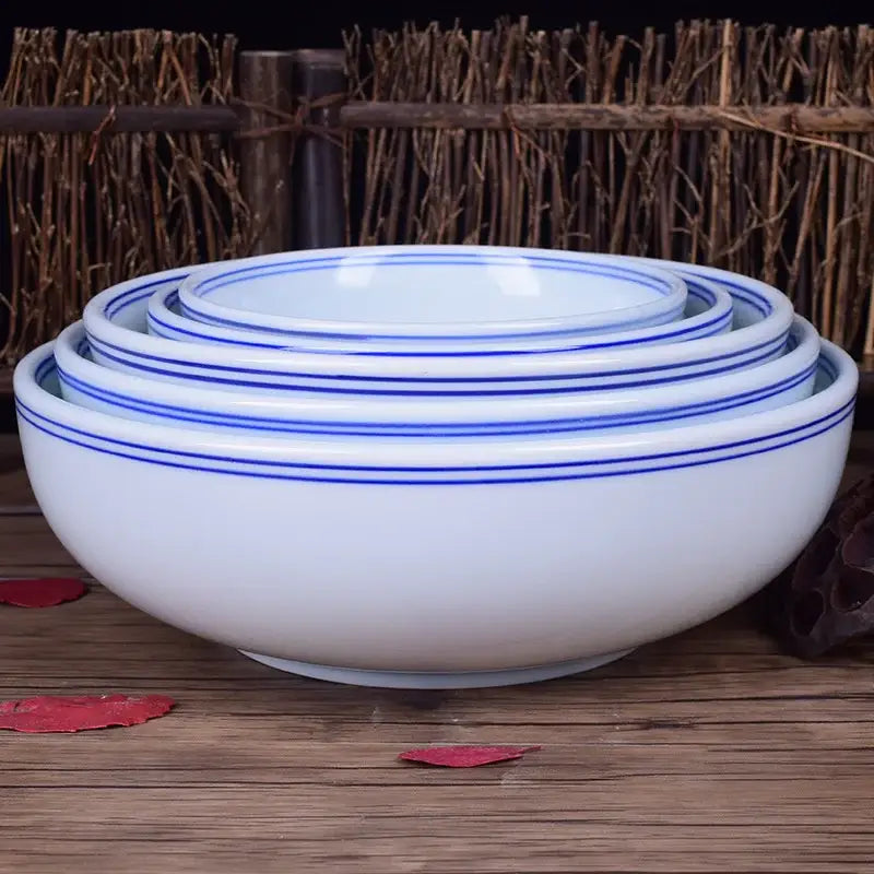 Set of four white ceramic noodle bowls with elegant blue concentric stripes by decorbites blue for dining tableware