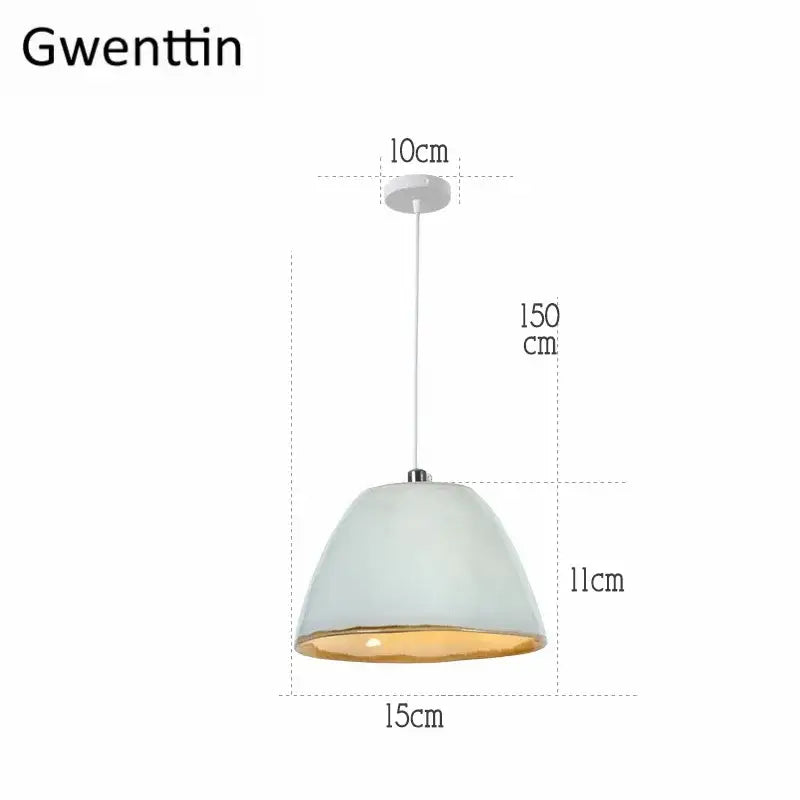 A sleek white ceramic led pendant light with gold interior lining for kitchen warm glow decorbites ceramic led lighting