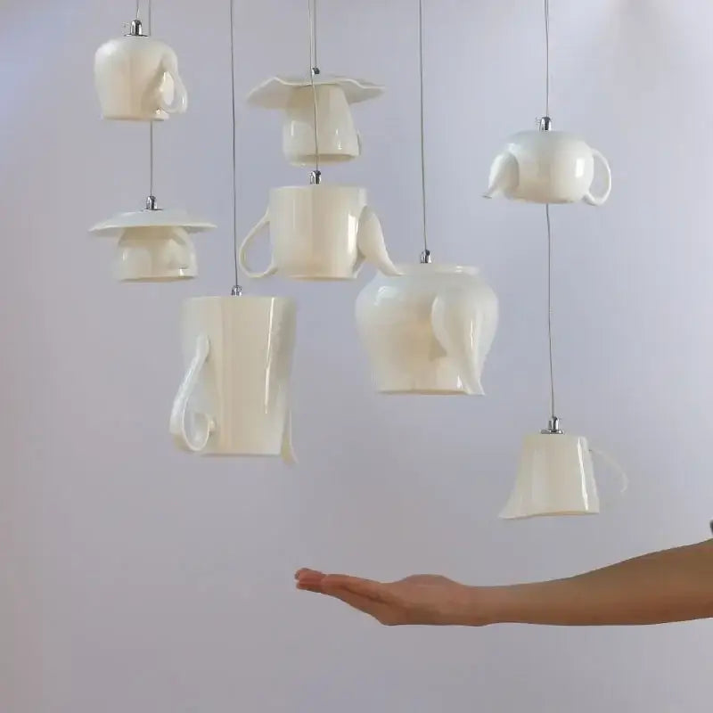 White ceramic teapot ceramic led pendant chandelier with hanging tea cups for warm kitchen lighting decorbites pendant lights