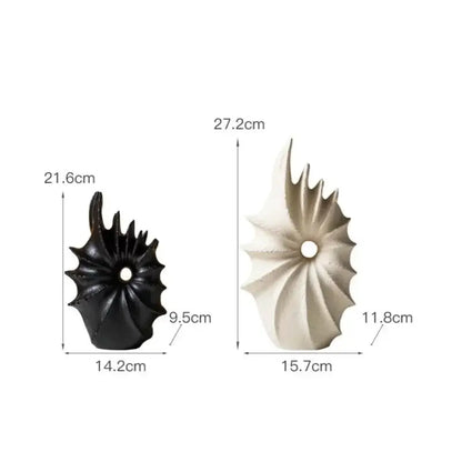 Black and off-white glossy ceramic vase in conch shape ideal for artificial flower arrangements in living room