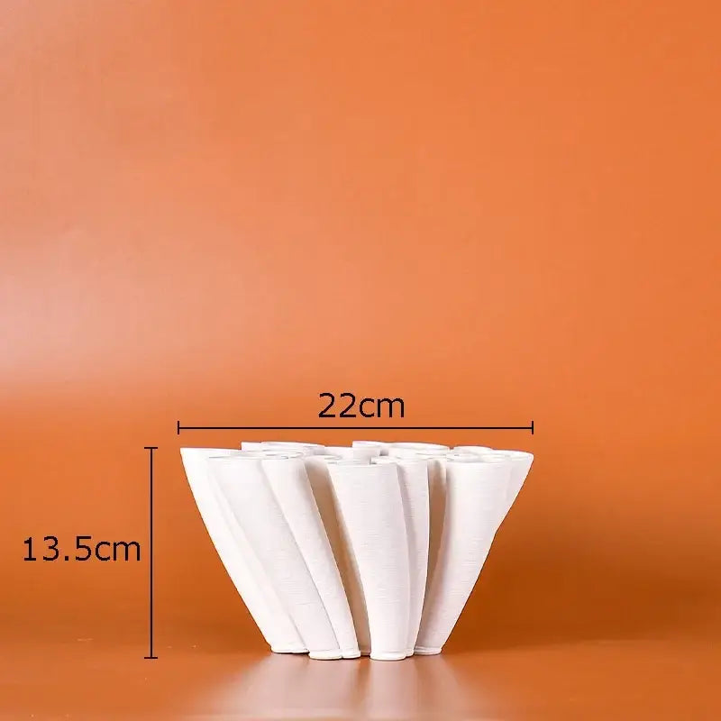 White coral ceramic vase plant with fluted petal-like ridges designed as a modern sculptural vase plant pot
