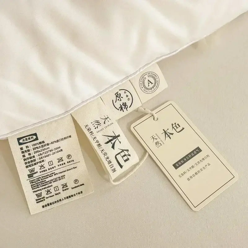White cotton soya fibre filling embroidered duvet with natural unbleached pillowcase and chinese character tags