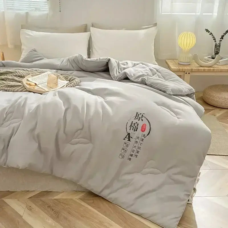 White cotton soya fibre filling embroidered duvet in light gray with subtle texture for bedroom comfort by decorbites cotton soya