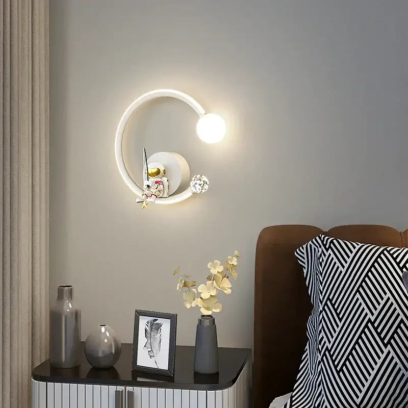 Modern white crescent astronaut wall lamp with glowing spherical light for bedroom starlight decorbites astronaut wall lamp