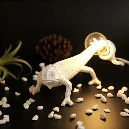 White decorbites chameleon figure resin wall lamp with glowing bulb held in mouth for bedroom night light