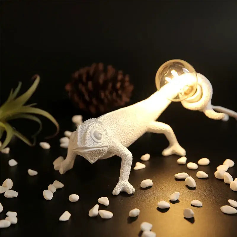 White decorbites chameleon figure resin wall lamp with glowing bulb held in mouth for bedroom night light