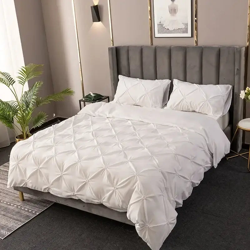 White diamond pinch pleated duvet cover set with soft plush texture and elegant quilted diamond stitching pattern