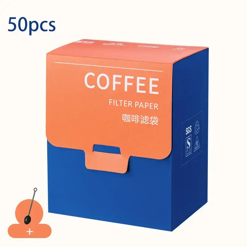 A vibrant orange and blue decorbites coffee filter box containing 50 white disposable filter bags for kitchen pour over