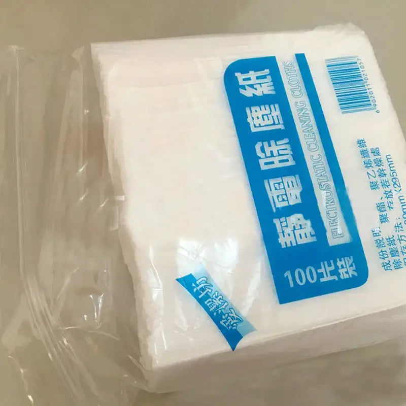 A package of 100 white electrostatic dust removal cloths sealed in plastic for kitchen and general dust removal tasks