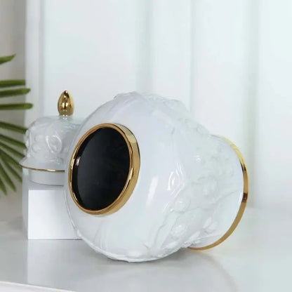 White embossed flower ceramic ginger jar vase with gold trim and floral relief for living room storage