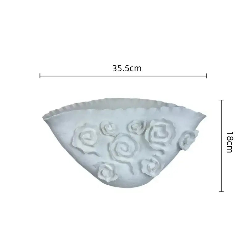 White embossed rose ceramic wall-mounted bowl with scalloped rim for living room decor by decorbites embossed rose