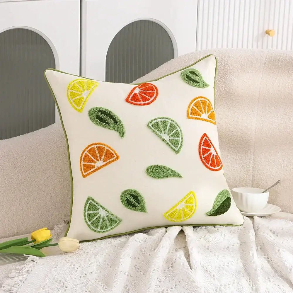 Cream-colored embroidered pillow case featuring vibrant cactus lemon dandelion citrus slices for living room decorbites decor