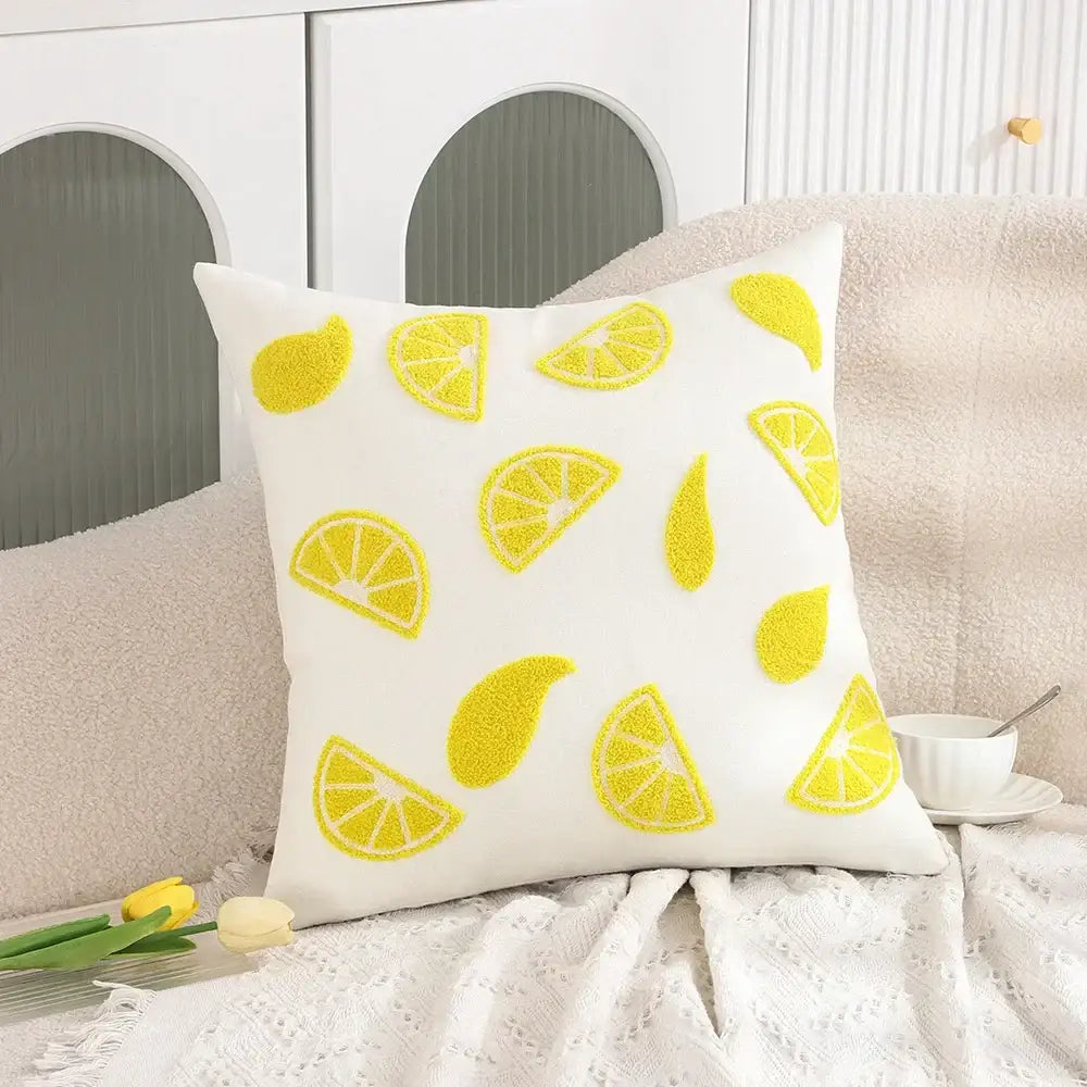 White embroidered cactus lemon pillow case with playful yellow lemon slice and teardrop decorbites cactus lemon design
