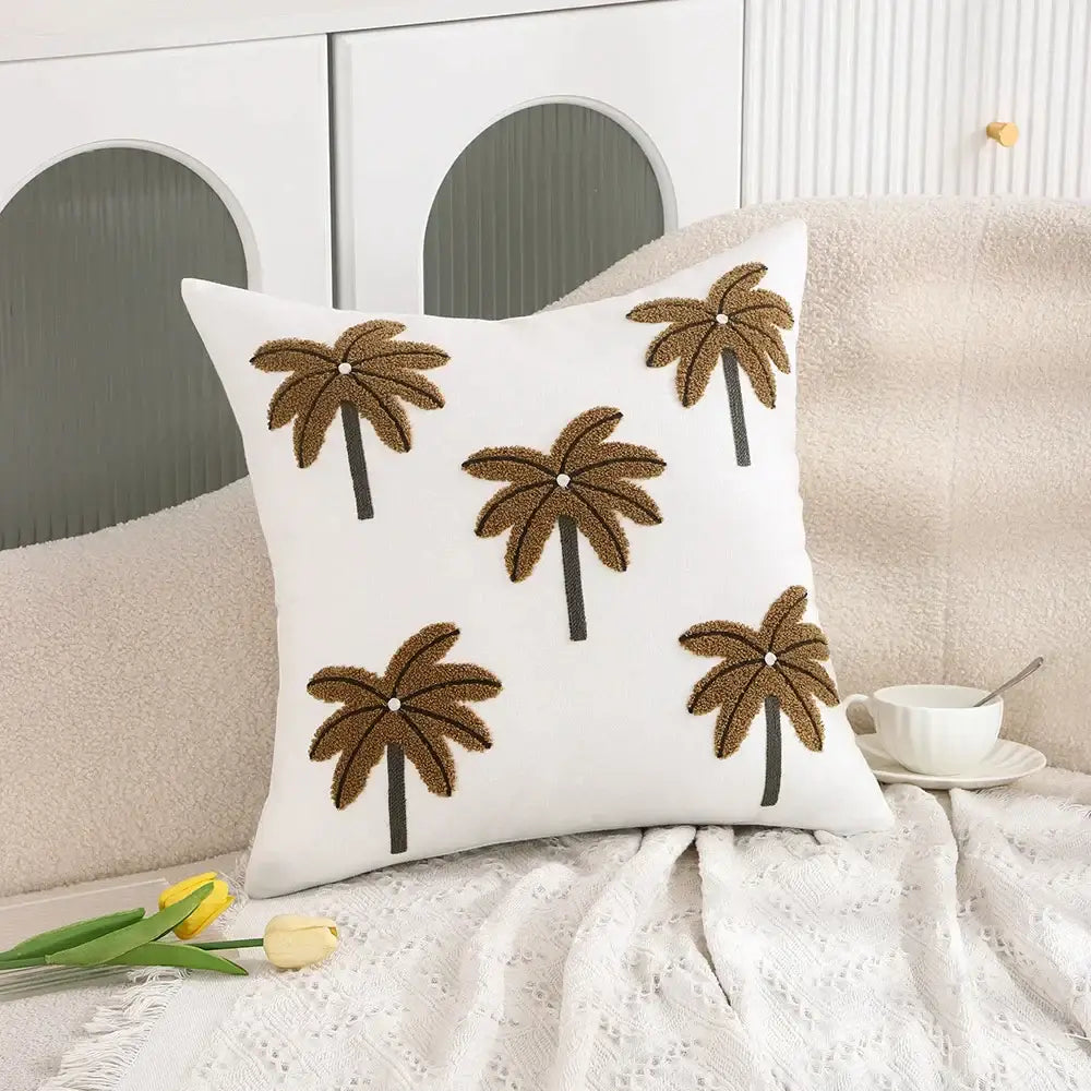 White embroidered cactus lemon pillow case with brown palm trees and black trunks for decorbites cactus lemon decor