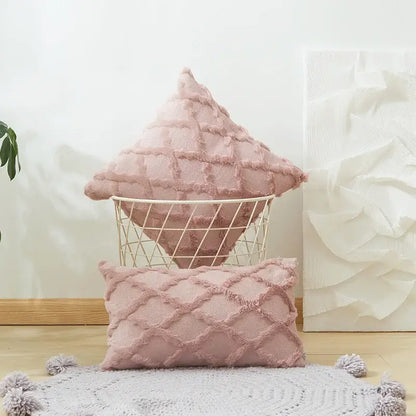 Soft pink embroidered diamond cushion cover with textured diamond pattern and fringed edges for living room decor
