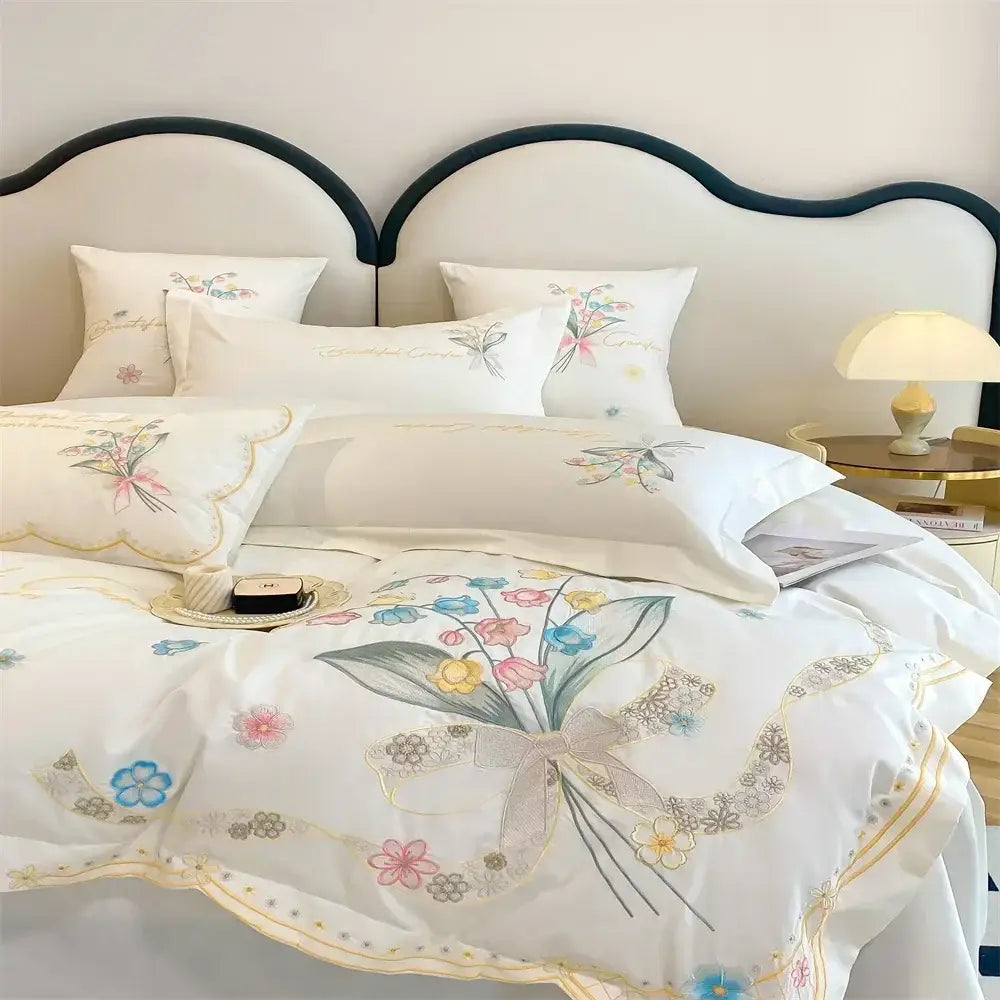 White floral butterfly flowers embroidery bedding set with delicate pastel blossoms and gold thread detailing