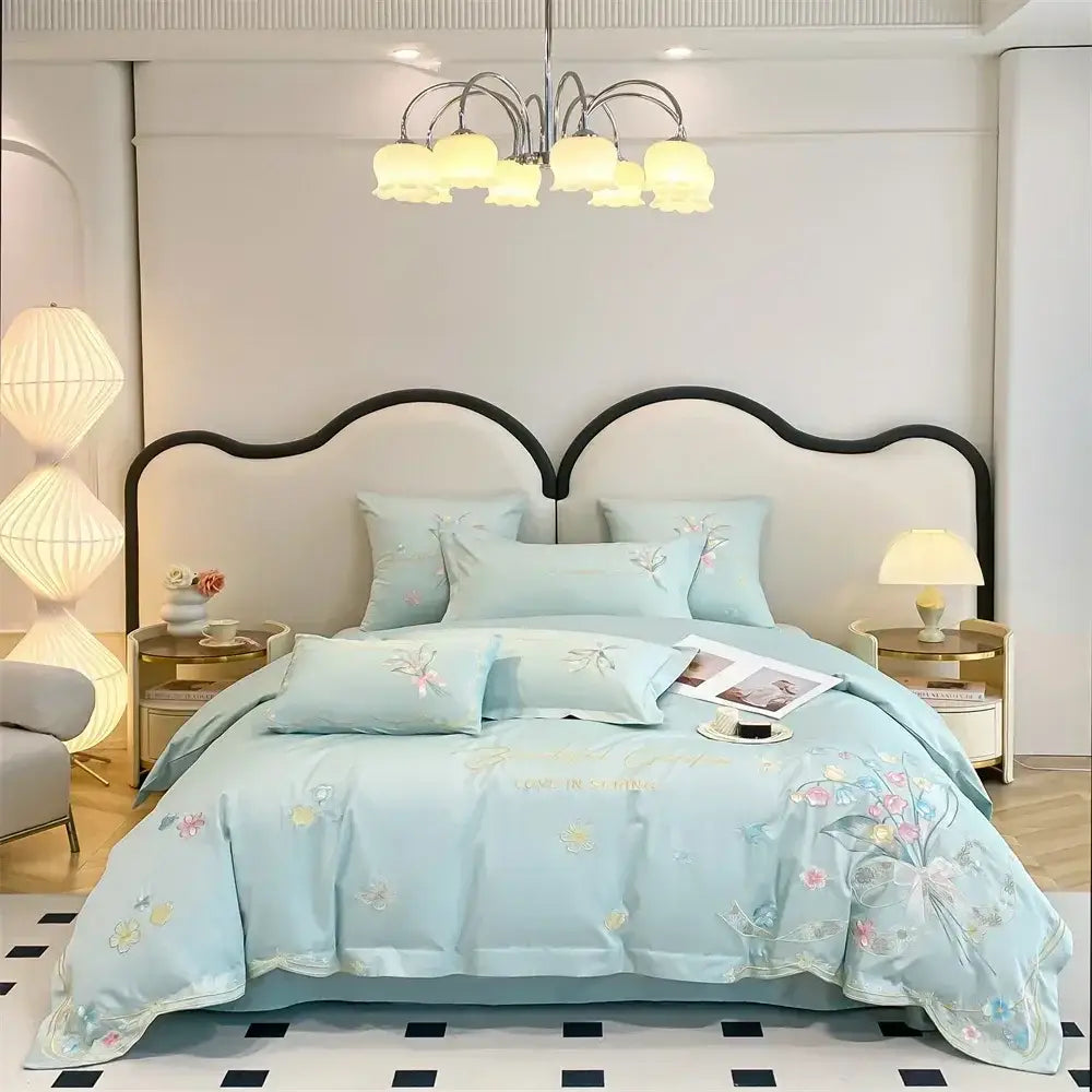Light blue satin bedding set with delicate pink and yellow floral decorbites butterfly flowers embroidery design