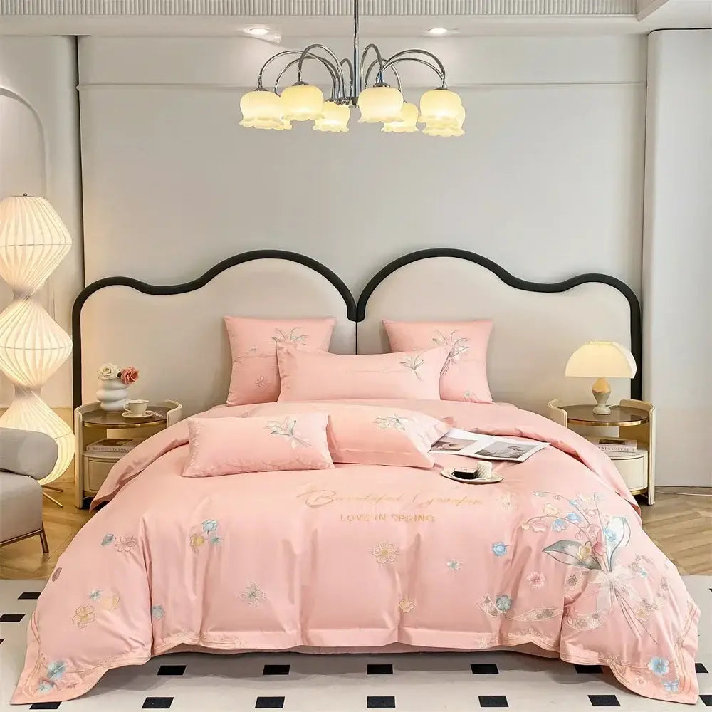 Pink floral embroidered bedding set with butterfly flowers embroidery and soft satin finish for elegant bedroom decorbites