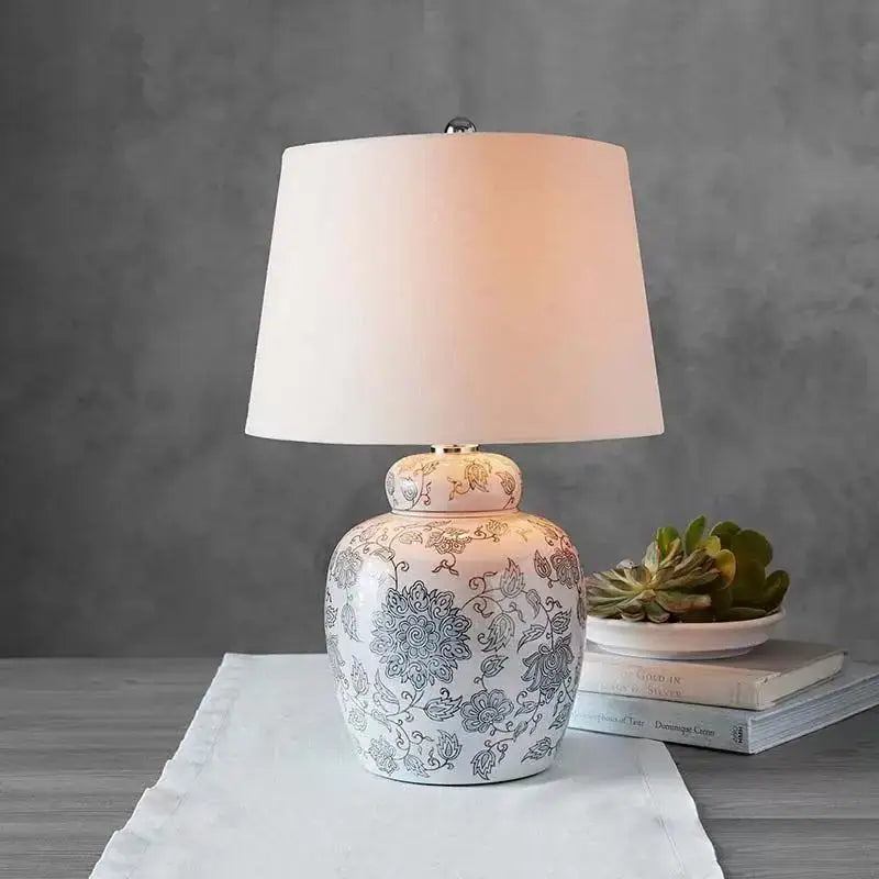 White floral ceramic desk lamp with delicate blue patterns and soft beige shade for bedroom side table decorbites ceramic desk lamp