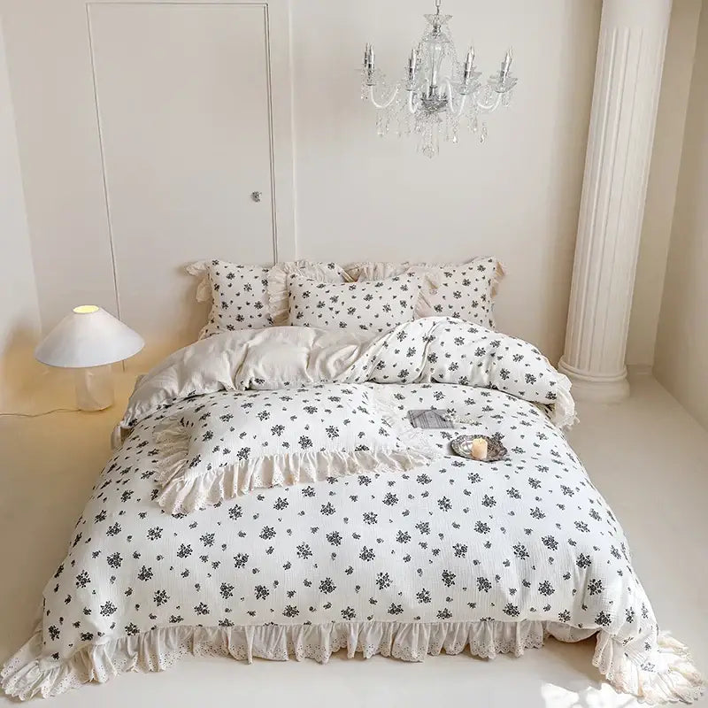 White floral cotton bedding set with lace ruffles and delicate ruffle details for elegant bedroom decor