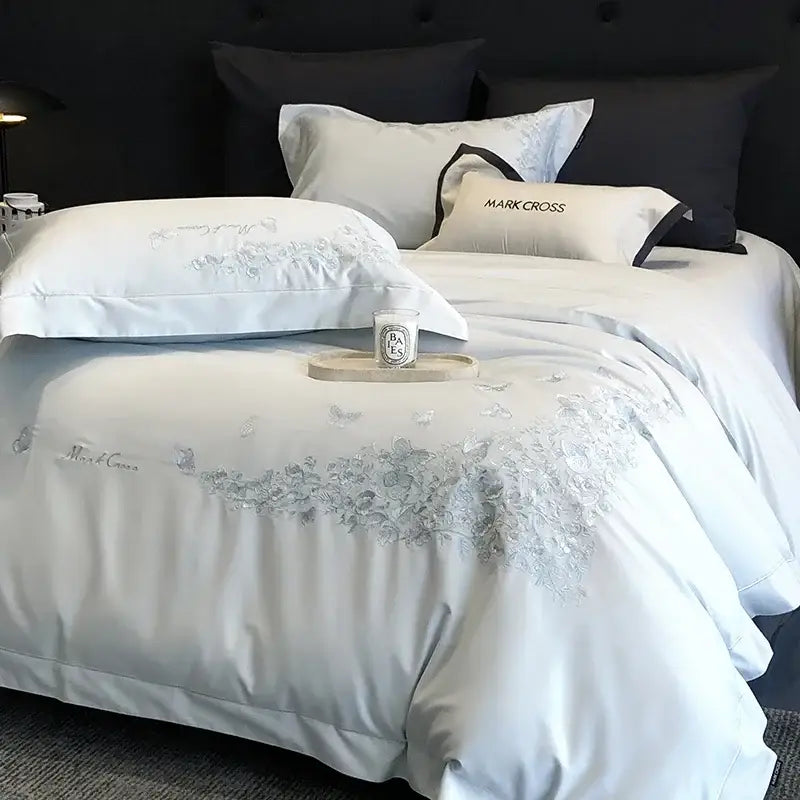 Light blue mark cross embroidered duvet cover with silver floral detailing in white floral egyptian cotton bedding sets