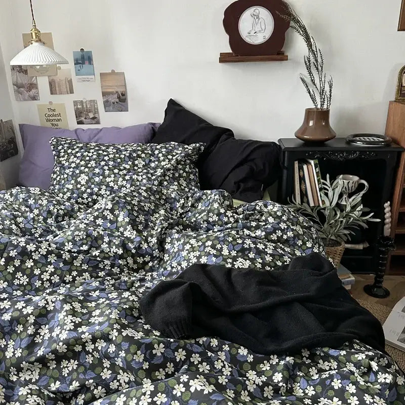 Dark green cotton duvet cover set with white and purple floral embroidery and soft natural drape for bedroom bedding
