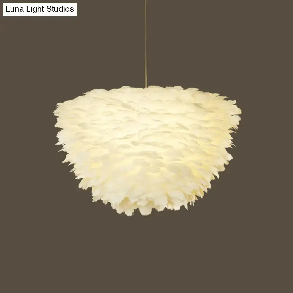 White floral pendant chandelier with soft off-white feather accents and layered design for dining room lighting